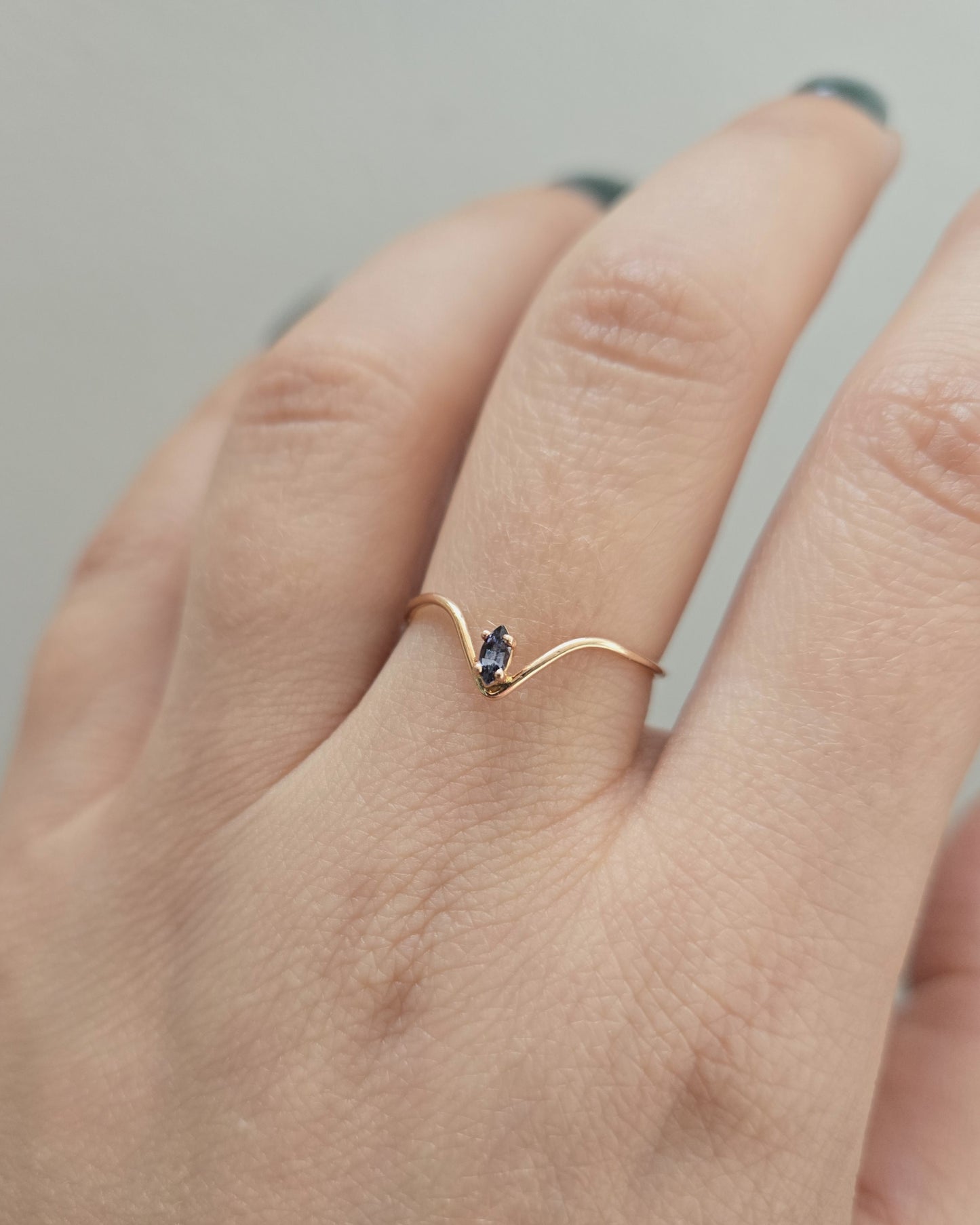 Cookie & Biscuits Ring in rose gold modeled on a hand.