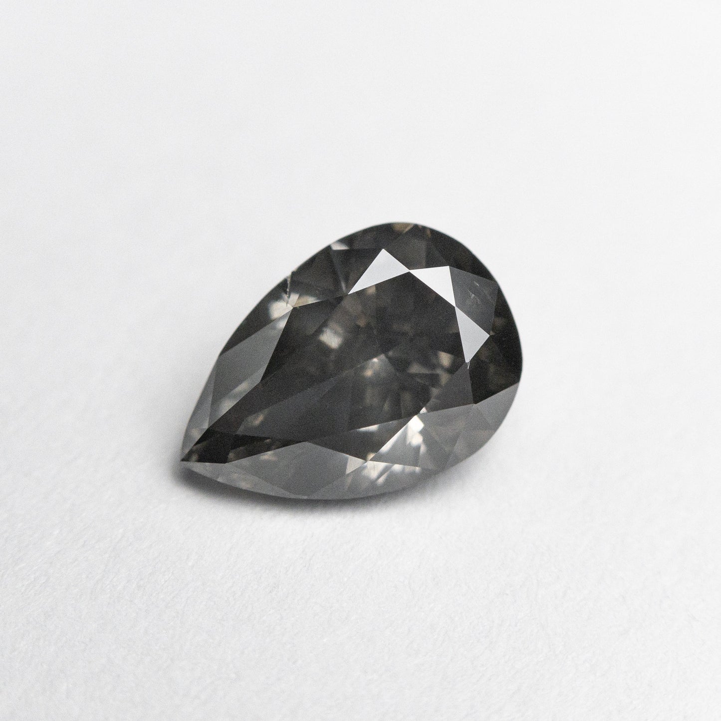 1.01ct 7.83x5.42x3.38mm Fancy Dark Grey Pear Brilliant 19913-01