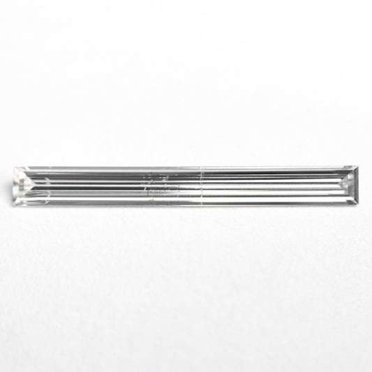 0.52ct 19.44x2.17x1.09mm SI2 E Baguette Step Cut 26545-01