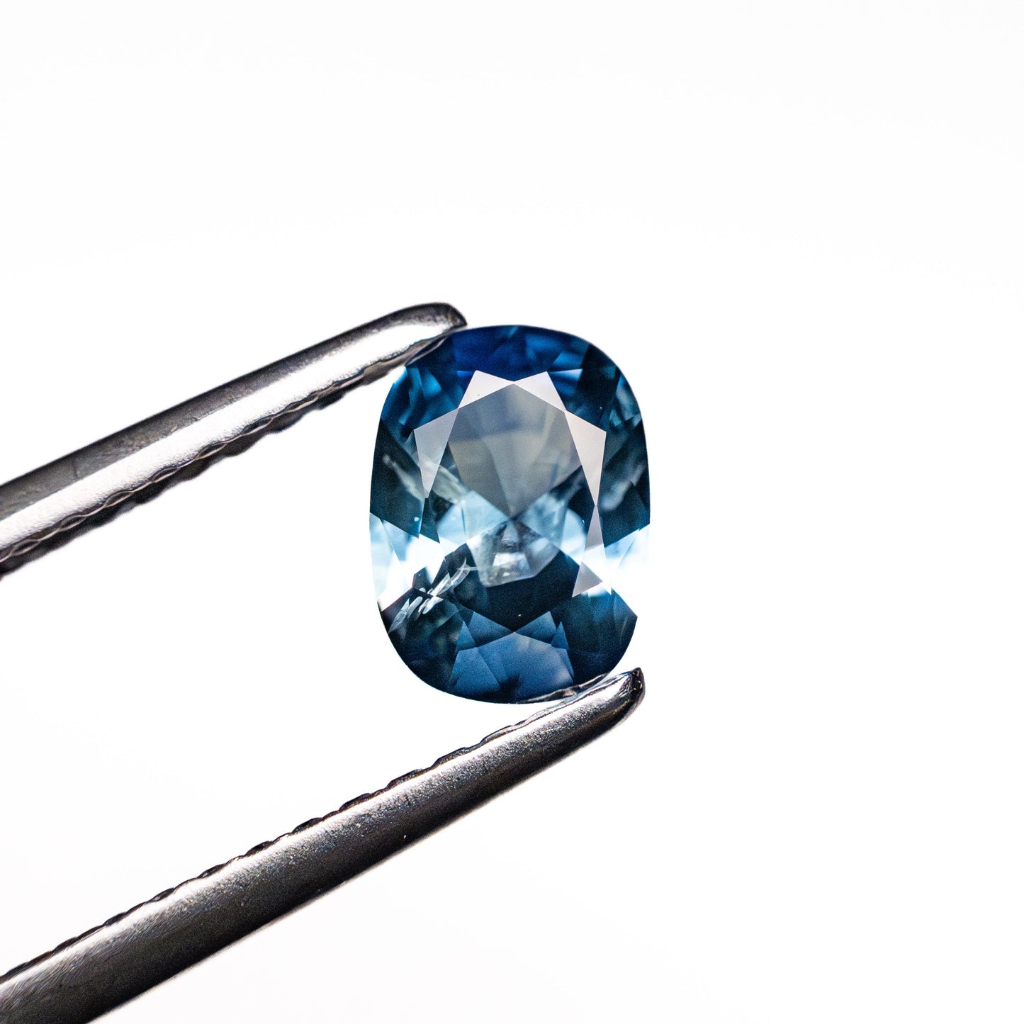 0.64ct 6.32x4.62x2.69mm Cushion Brilliant Sapphire 26673-11
