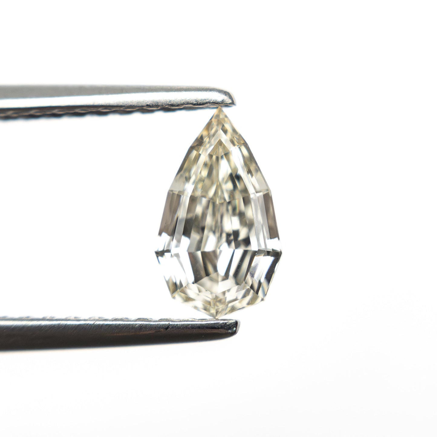 0.71ct 7.85x4.68x2.90mm VVS2 Q-R Geo Pear Step Cut 🇿🇦 27364-15