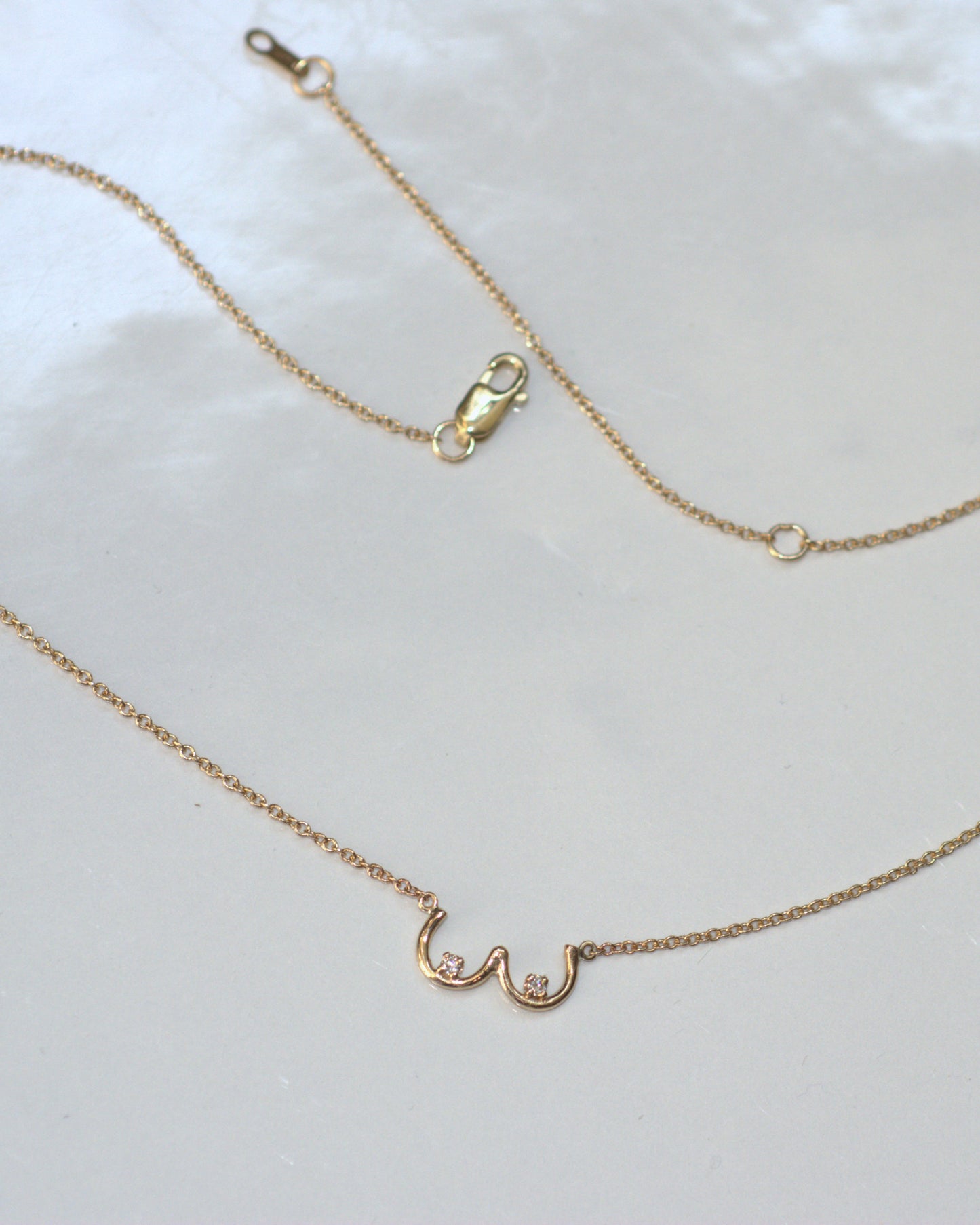 Boob Necklace in 14k yellow gold