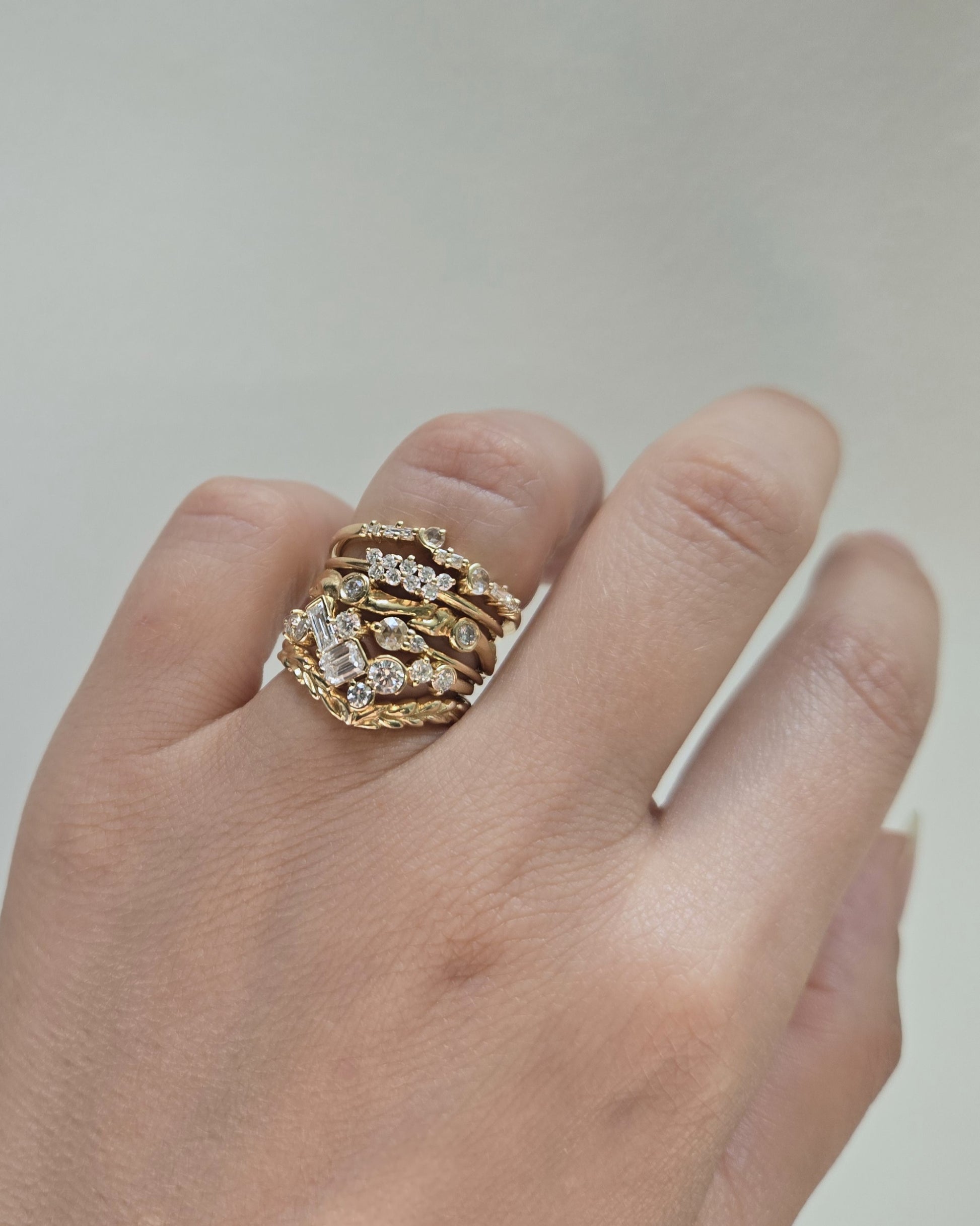 Diamond bands stacked on a finger