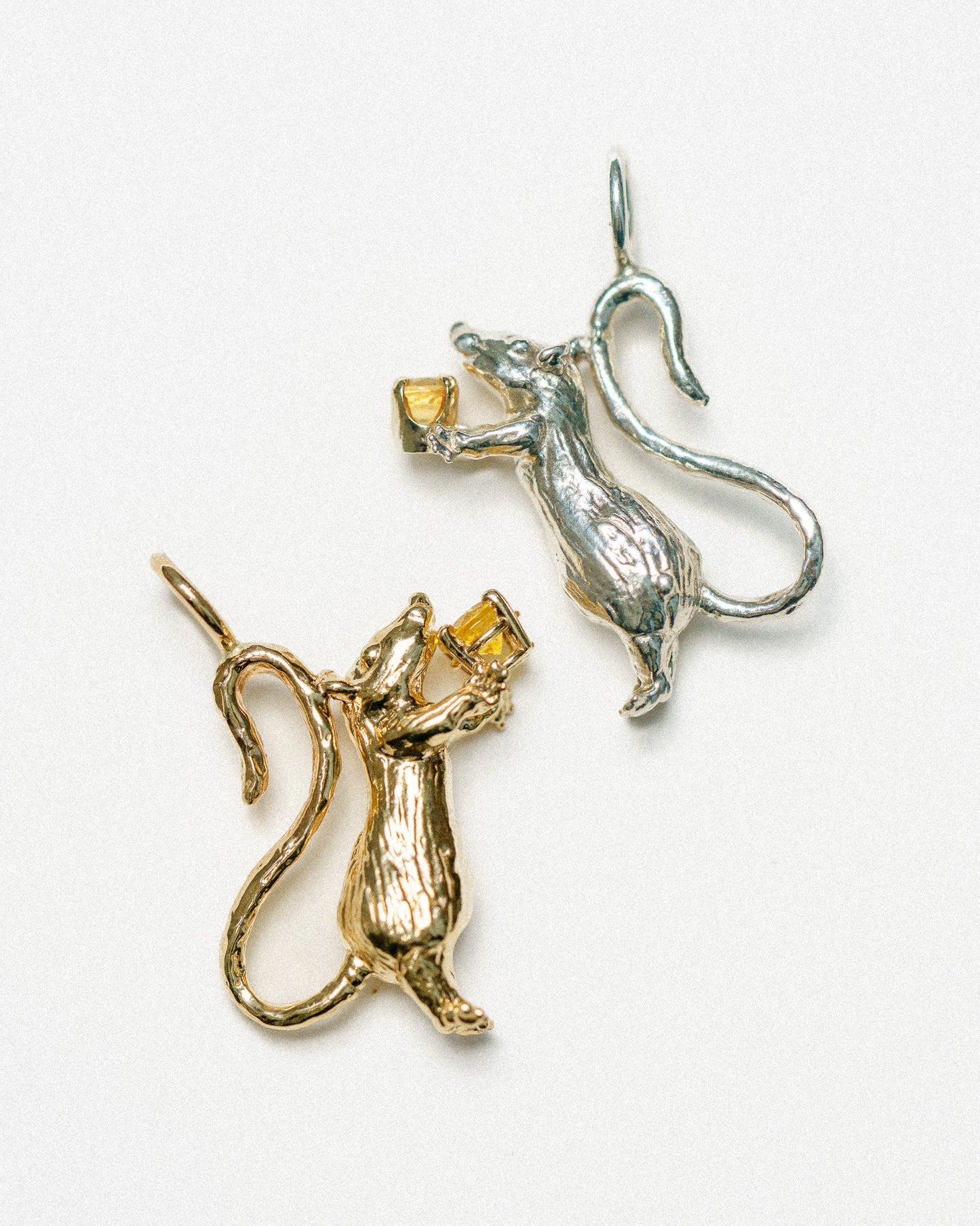Emille Charm in 14k yellow gold and sterling silver