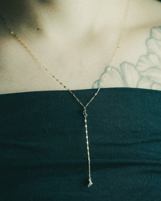 Luna Lariat Necklace with salt & pepper crescent moon diamonds on a keyhole chain