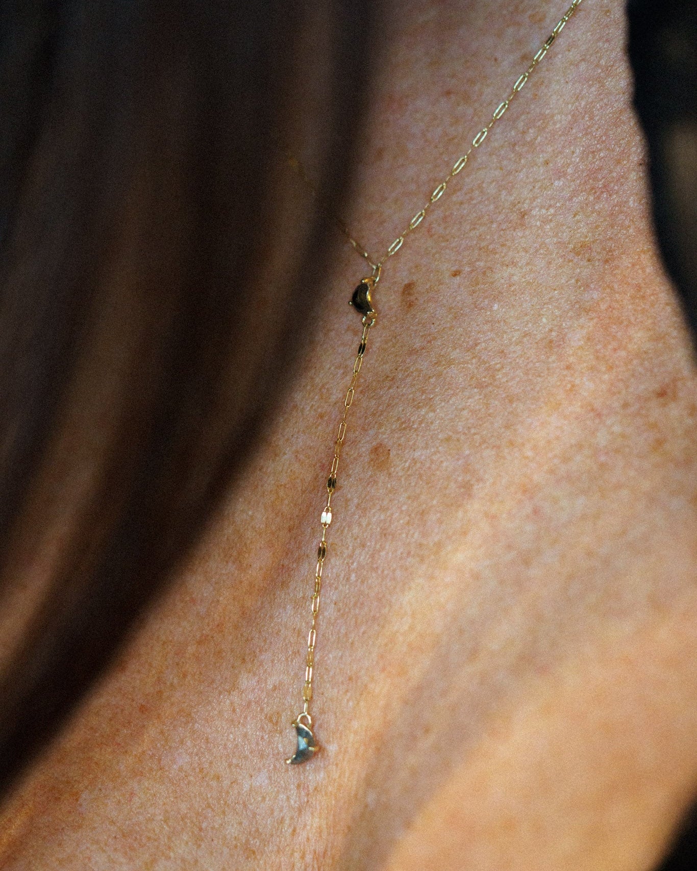 Luna Lariat Necklace with salt & pepper crescent moon diamonds on a keyhole chain