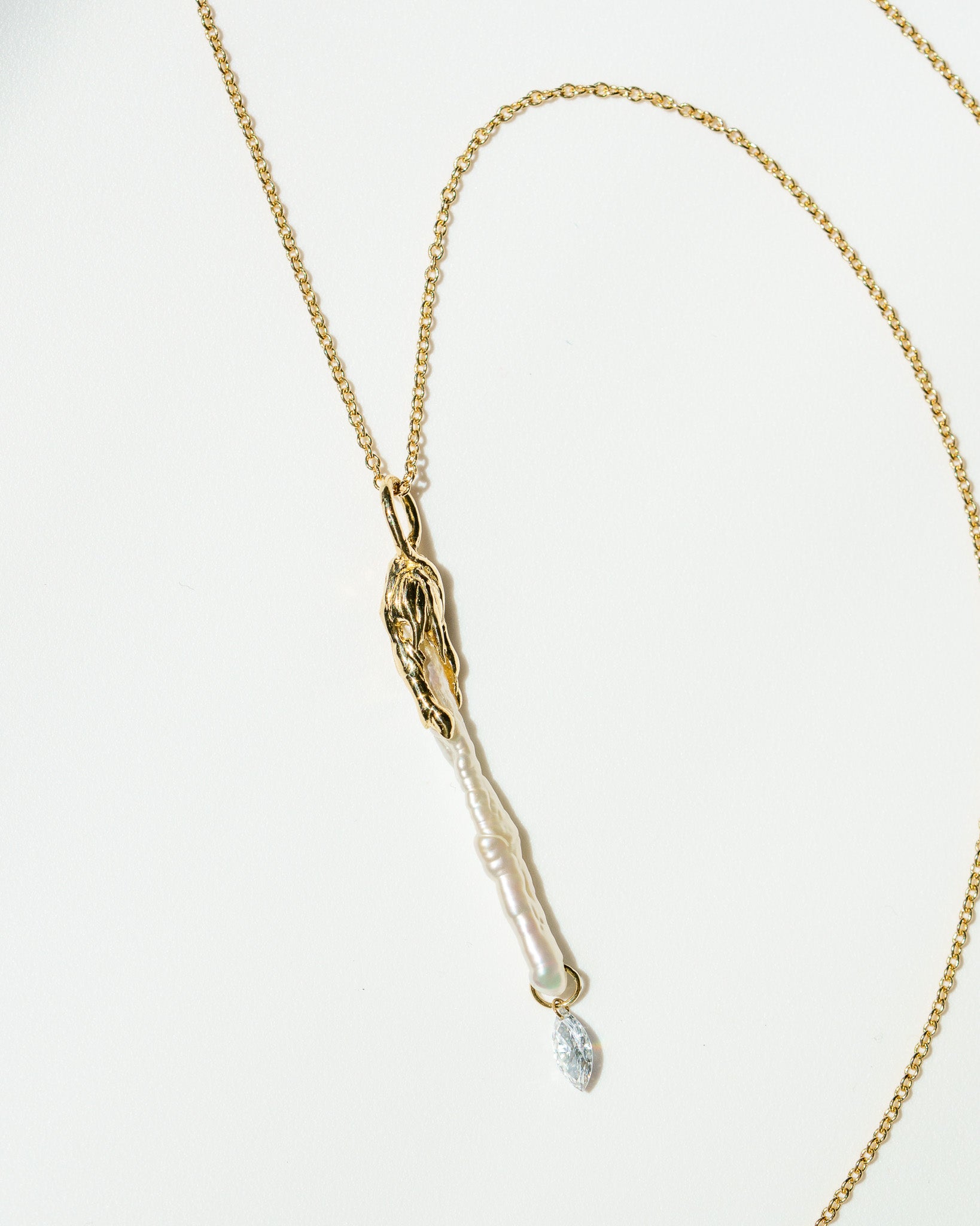 Stalactite Charm with marquise diamond on a yellow gold chain