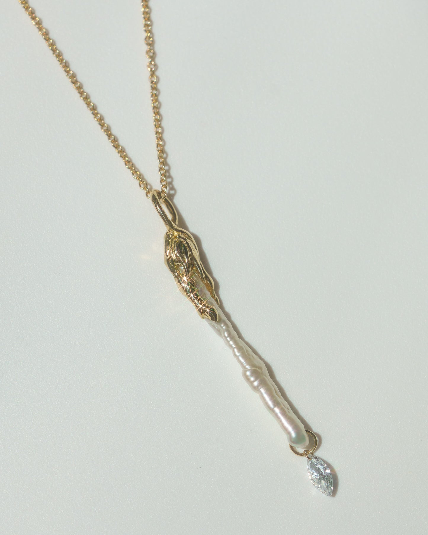 Stalactite Charm with marquise diamond on a yellow gold chain