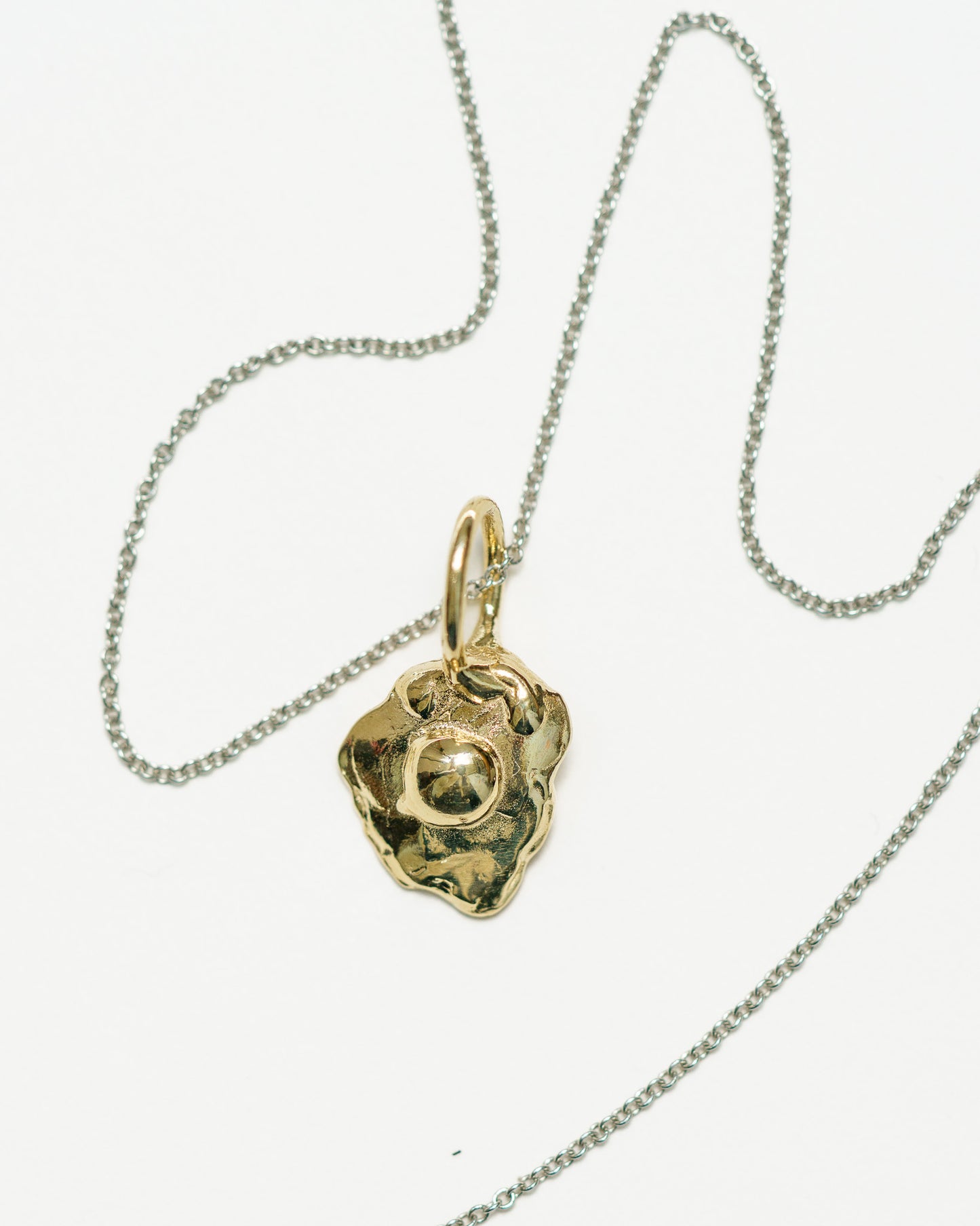 Sunnyside Charm in 14k yellow gold on a silver chain