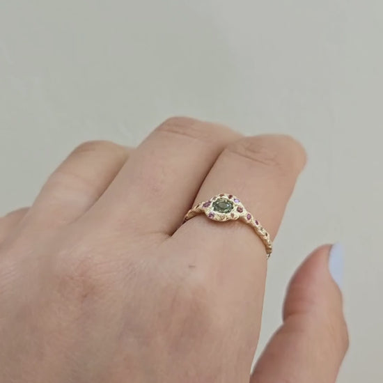 Video of Green Sapphire Fairy Ring in yellow gold modeled on a hand