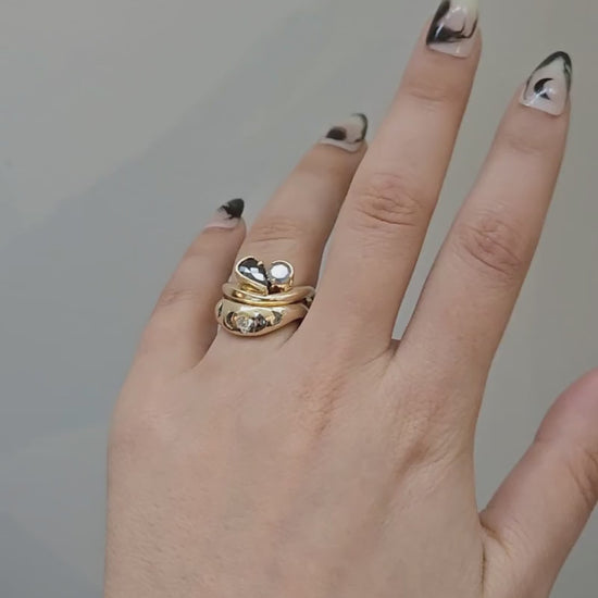 Veniszka Band with flush set salt & pepper diamond crescent moons and a round white diamond stacked with Bellatryx Toi et Moi Ring